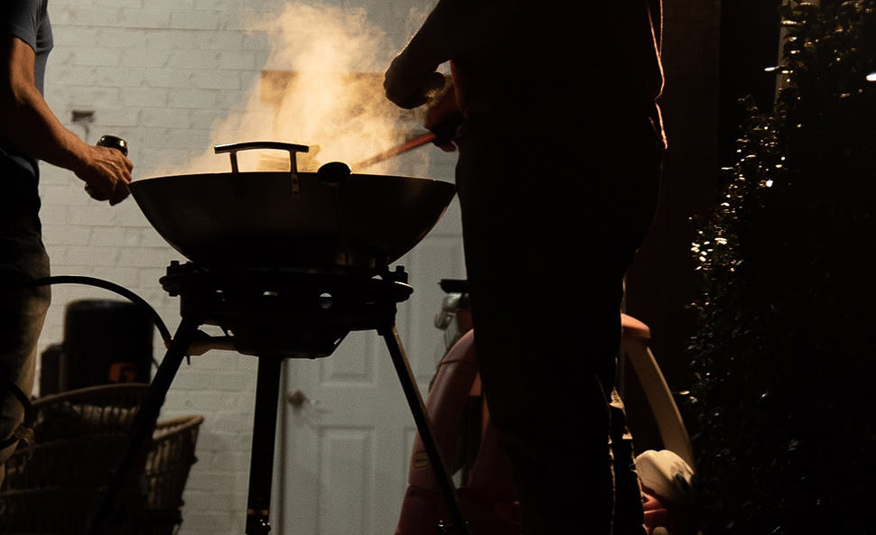 Eastman-Outdoors grilling outside