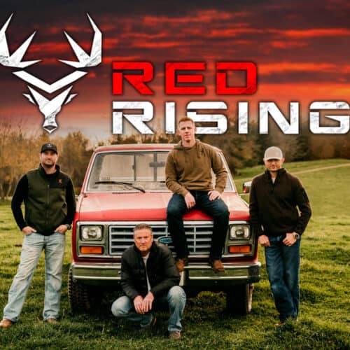 Pro Staff Red Rising group photo around red truck
