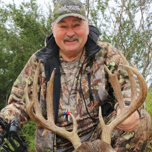 Pro Staff Roger Raglin with antlers of downed buck