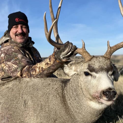 Pro Staff Tim Andrus with downed buck